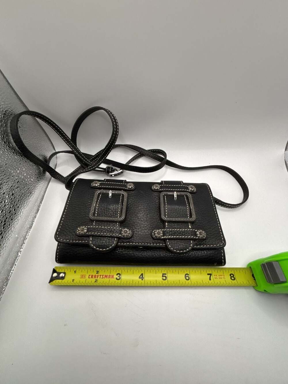 Brighton Black Pebbled Leather Organizer Wallet with Buckle Accents and Strap - Picture 6 of 7